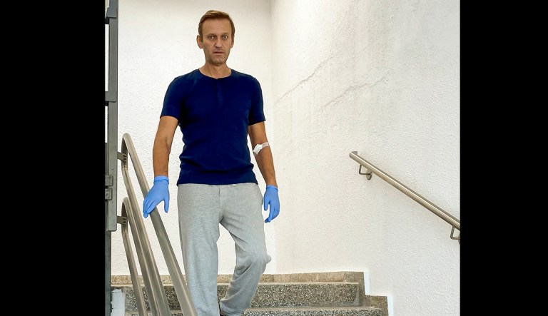 In this handout photo taken from a video published  by Russian opposition leader Alexei Navalny on his instagram account, Russian opposition leader Alexei Navalny steps down in a hospital in Berlin, Germany, Saturday, Sept. 19, 2020.