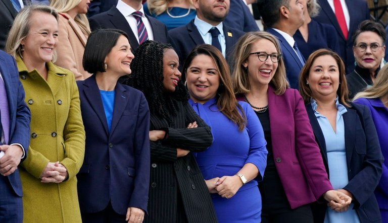 Rep.-elect Nikki Budzinski, D-Ill., from left, Rep.-elect Becca Balint, D-Vt., Rep.-elect Summer Lee, D-Pa., Rep.-elect Delia Ramirez, D-Ill., Rep.-elect Hillary Scholten, D-Mich., and Yadira Caraveo, Democratic candidate in Colorado's 8th Congressional District, stand for a class photo of newly-elected members of Congress.