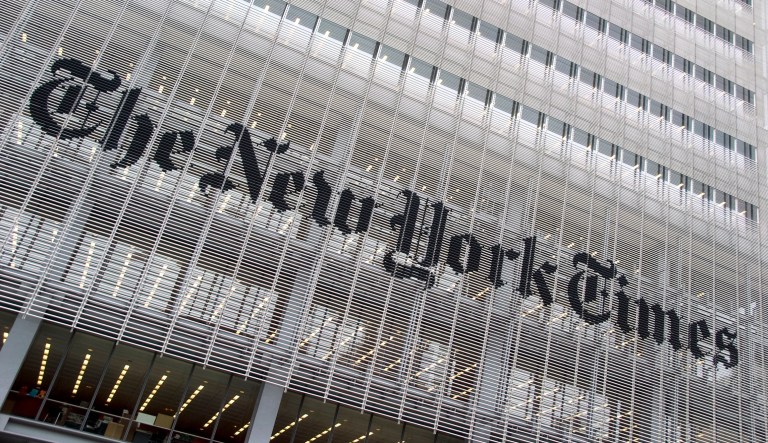 "New York, USA - April 1st, 2008: Facade of the New York Times headquarters building on 8th Ave. in Midtown Manhattan. The building was completed in 2007. The New York Times is an american daily newspaper that was founded in 1851."