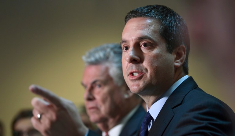 House Intelligence Committee Chairman Rep. Devin Nunes, R-Calif., right, standing with Rep. Peter King, R-N.Y., left, speaks on Capitol Hill in Washington, Tuesday, Oct. 24, 2017. 