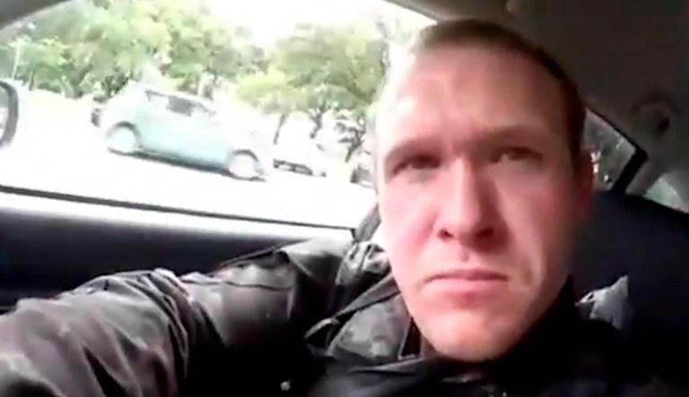 This image taken from the alleged shooterâs video, which was filmed Friday, March 15, 2019, shows him as he drives and he looks over to three guns on the passenger side of his vehicle in New Zealand.