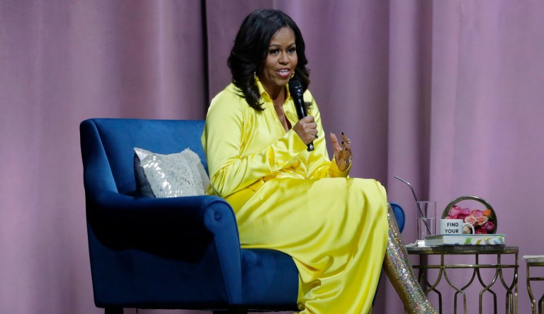 Former first lady Michelle Obama speaks as she is interviewed by Sarah Jessica Parker during an appearance for her book, "Becoming: An Intimate Conversation with Michelle Obama" at Barclays Center Wednesday, Dec. 19, 2018, in New York.