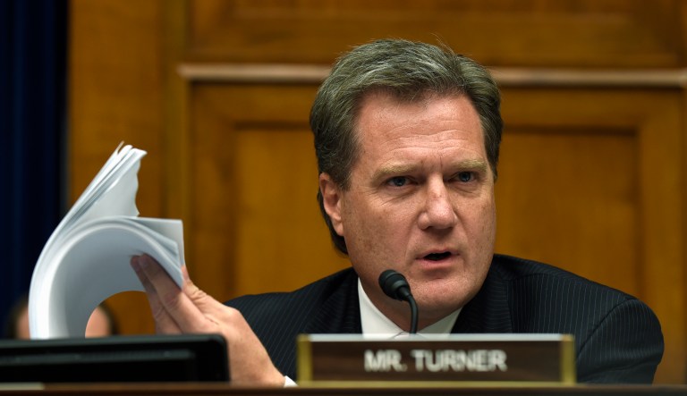 House Oversight and Government Reform Committee member Rep. Mike Turner, R-Ohio holds up a security form as he asks questions during the committee's hearing on recent cyber attacks at OPM, Wednesday, June 24, 2015, on Capitol Hill in Washington. The OPM is under fire for allowing its databases to be plundered by suspected Chinese cyberspies in what is being called one of the worst breaches in U.S. history.