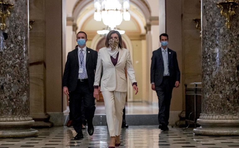 Democrats advance big budget plan that splits party