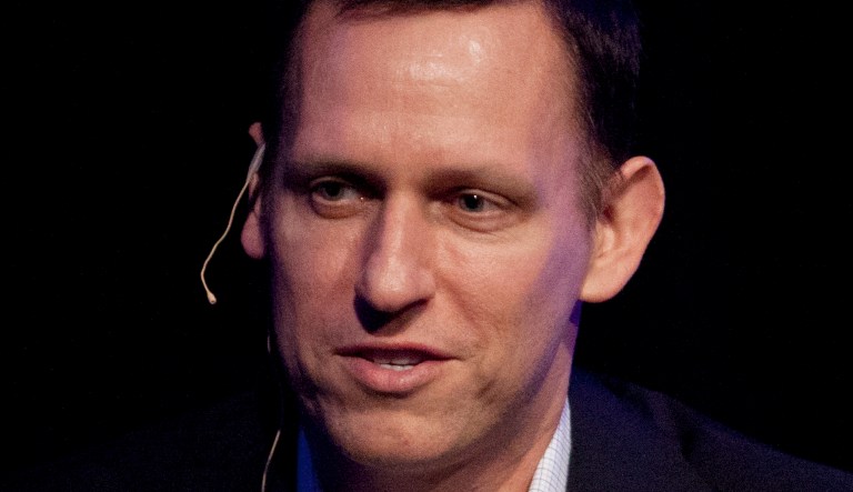 Clarium Capital President Peter Thiel gestures while giving the keynote speech during the StartOut LGBT Entrepreneurship Awards Thursday, March 8, 2012, in San Francisco. 