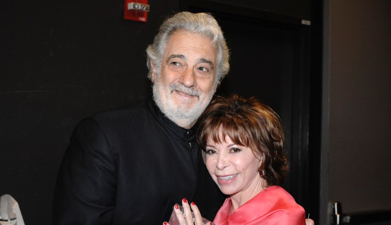 Conductor and tenor Placido Domingo, left, and writer Isabel Allende speak to an audience on the opening night and at the world premiere of the opera "Dulce Rosa" co-produced by The Broad Stage and LA Opera in Santa Monica, Calif. on Friday, May 17, 2013. Domingo will be conducting the opera, based on the short story "Una Veganza" written by Allende.
