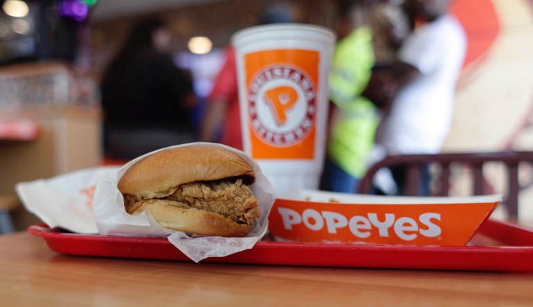 FILE - This Aug. 22, 2019, file photo shows a chicken sandwich at a Popeyes restaurant in Kyle, Texas. Police in Maryland say a man fatally stabbed another customer outside a Popeyes restaurant in a fight over cutting in line while waiting to buy the recently rereleased chicken sandwich at an Oxon Hill, Md., Popeyes on Monday night, Nov. 4, 2019.