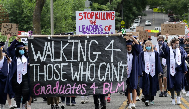 A San Francisco 49ers cheerleader kneels during the national anthem before an NFL football game between the 49ers and the Chicago Bears in Santa Clara, Calif., Sunday, Dec. 23, 2018. 
