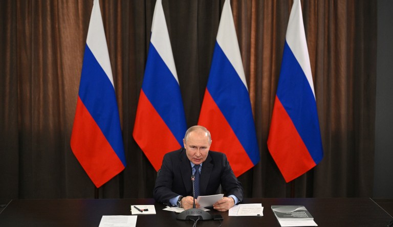 Russian President Vladimir Putin attends a meeting on economic issue in Moscow, Russia, Wednesday, Feb. 12, 2020.