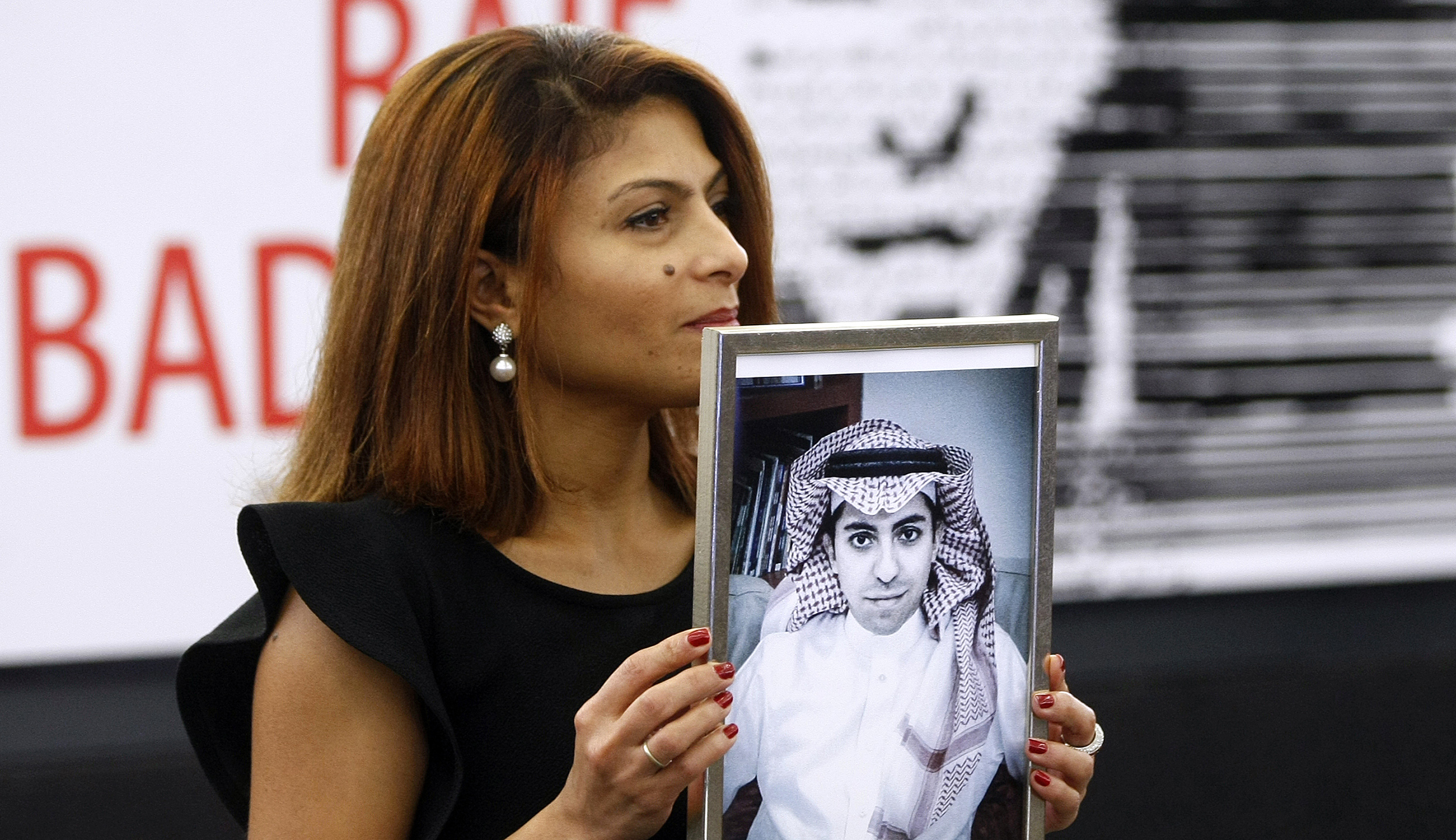 Wife of jailed Saudi journalist pleads with Trump to win his release