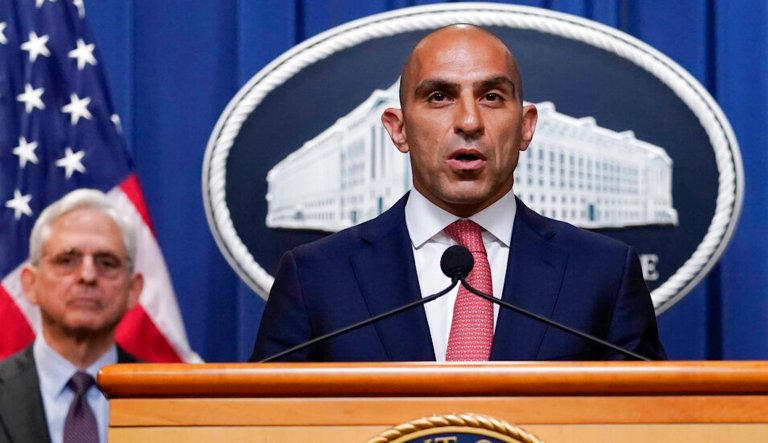 Commodity Futures Trading Commission Chairman Rostin Behnam speaks during a news conference at the Department of Justice, Tuesday, May 24, 2022.