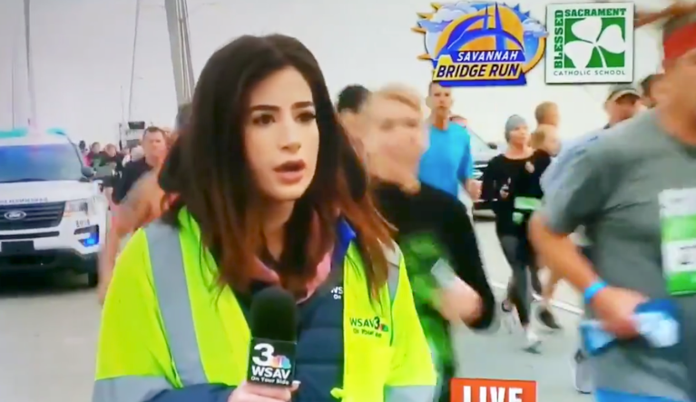 Runner smacks rear end of reporter on Savannah bridge