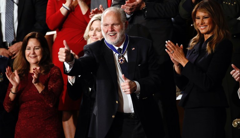 Rush Limbaugh reacts as first Lady Melania Trump, and his wife Kathryn, applaud, as President Donald Trump delivers his State of the Union address to a joint session of Congress on Capitol Hill in Washington, Tuesday, Feb. 4, 2020.