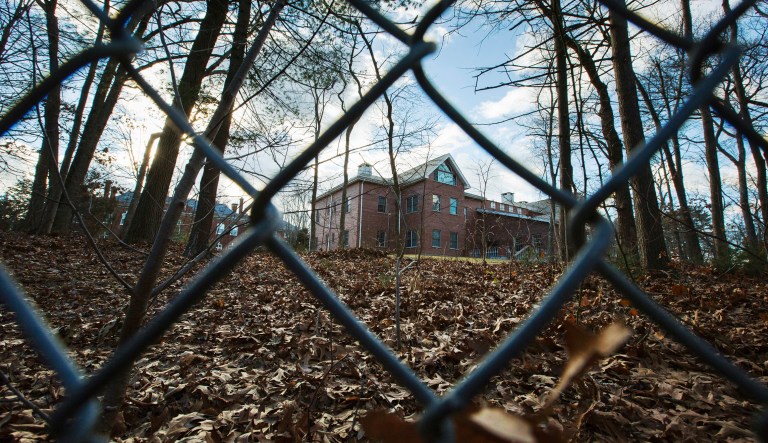  In this Dec. 30, 2016, file photo, a fence encloses an estate in the village of Upper Brookville in the town of Oyster Bay, N.Y., on Long Island. Resolving a dispute over Russian diplomatic compounds the U.S. seized last year could help repair relations between Washington and Moscow.