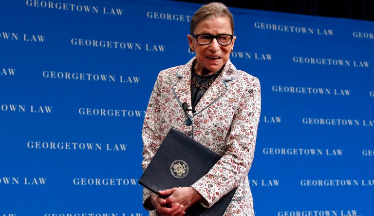 In this Sept. 26, 2018, file photo, Supreme Court Justice Ruth Bader Ginsburg leaves the stage after speaking to first-year students at Georgetown Law in Washington. Ginsburg has been hospitalized after fracturing three ribs in fall at court.