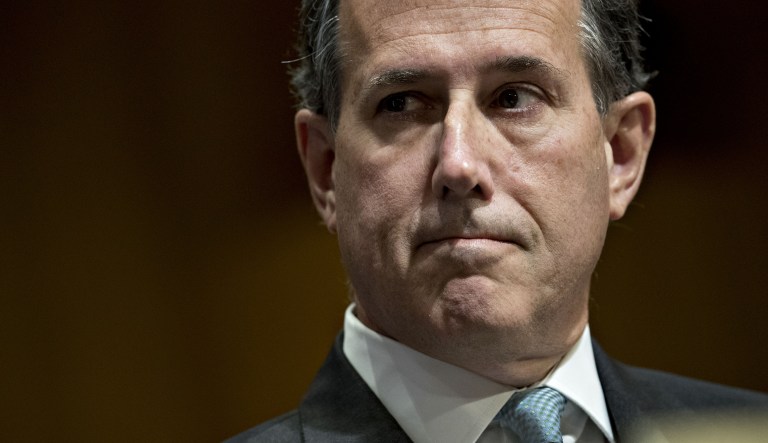 Rick Santorum, former senator from Pennsylvania, listens during a Senate Finance Committee hearing to consider the Graham-Cassidy-Heller-Johnson proposal in Washington, D.C., U.S., on Monday, Sept. 25, 2017. Senators sponsoring a last-ditch Obamacare repeal bill raced to save it from near-certain death Sunday, circulating a new version aimed at winning over several GOP holdouts.