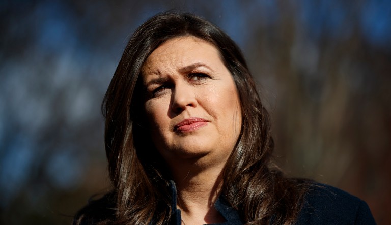 White House press secretary Sarah Sanders talks to reporters outside the White House, Wednesday, March 6, 2019, in Washington.