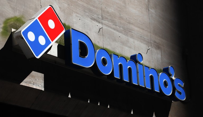 This is the sign on a Domino's Pizza shop in downtown Pittsburgh Monday, July 15, 2019. 