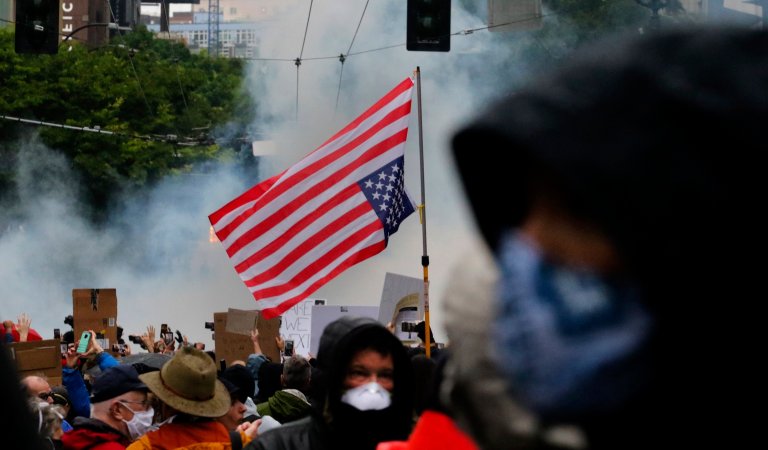 Smoke from a flash-bang rises on Pine Street east of Westlake Park.

Peaceful protest at Westlake Park and more violent group nearby.

Protests on Saturday May 30, 2020 214101 