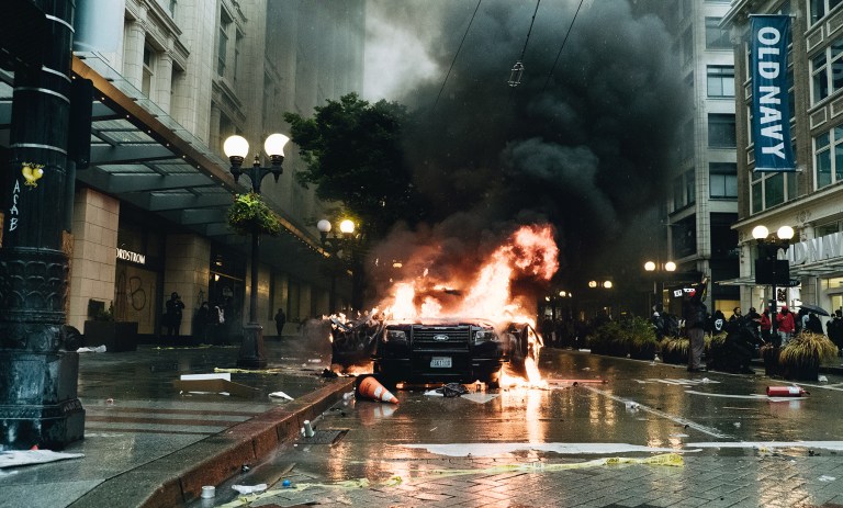 Car on fire in Seattle.
