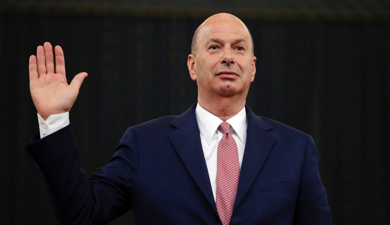 U.S. Ambassador to the European Union Gordon Sondland is sworn in to testify before the House Intelligence Committee on Capitol Hill in Washington, Wednesday, Nov. 20, 2019, during a public impeachment hearing of President Donald Trump's efforts to tie U.S. aid for Ukraine to investigations of his political opponents.