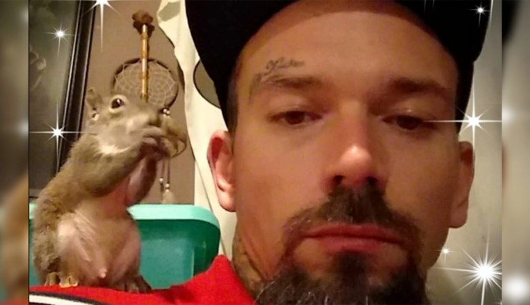 A man is pictured with a squirrel in a Facebook profile picture.