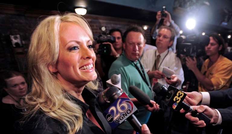 Stormy Daniels, left, smiles as she responds to questions from the media, including one about her knowledge of the record of U.S. Senator David Vitter, R-La. during her 'listening tour.'  Porn star and Baton Rouge native Daniels took questions from the media and talked with people on their lunch hour at The Roux House on Third Street Tuesday, May 5, 2009 in Baton Rouge, La. There is an effort underway called 'Draft Stormy' which seeks to convince her to run against U.S. Senator David Vitter (R-La.) and she is gauging public support and issues.