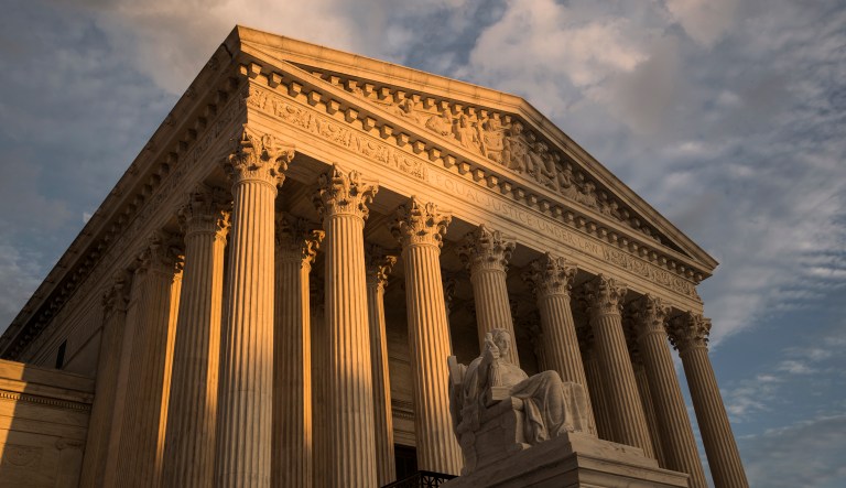 In this Oct. 10, 2017 photo, The Supreme Court in Washington is seen at sunset.  The Supreme Court is refusing to intervene in a legal fight over a Mississippi law that lets government workers and private business people cite their own religious beliefs to deny services to LGBT people. Opponents say the law could lead to discrimination against those who support same-sex marriage.