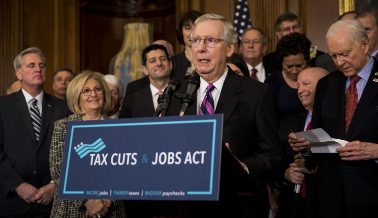 Senate Majority Leader Mitch McConnell, a Republican from Kentucky, speaks during a Tax Cuts and Jobs Act enrollment ceremony at the U.S. Capitol in Washington, D.C., U.S., on Thursday, Dec. 21, 2017. Republicans want to channel momentum from the GOP's victory on taxes into a push to overhaul the nation's welfare programs, though some of PresidentÂ Donald Trump's advisers prefer a less controversial infrastructure plan at the top of his agenda.