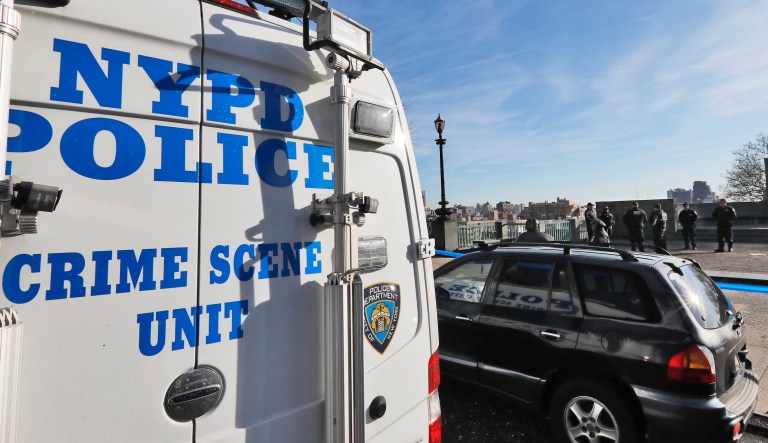 A New York City Police Dept. Crime Scene Unit and officers assemble at an entrance to Morningside Park along Manhattan's Upper West Side, Thursday, Dec. 12, 2019, in New York. An 18-year-old Barnard College freshman, identified as Tessa Majors, has been fatally stabbed during an armed robbery in the park, sending shock waves through the college and wider Columbia University community.