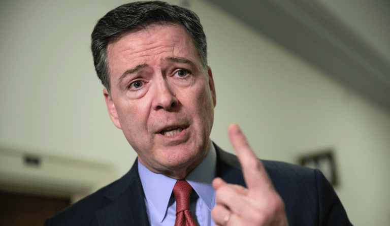 FILE - In this Dec. 17, 2018, file photo, former FBI Director James Comey speaks to reporters on Capitol Hill Washington. The Justice Departmentâs inspector general says former FBI Director James Comey violated FBI policies in his handling of memos documenting private conversations with President Donald Trump. (AP Photo/J. Scott Applewhite, File)