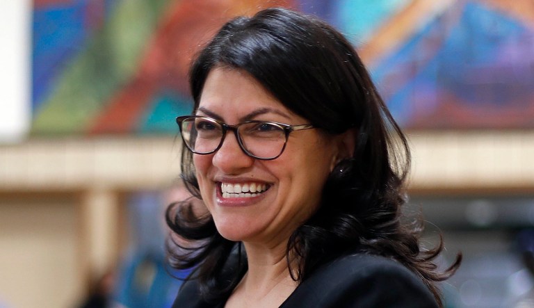 In this Oct. 26, 2018 file photo, Rashida Tlaib, Democratic candidate for the Michigan's 13th Congressional District, smiles during a rally in Dearborn, Mich.