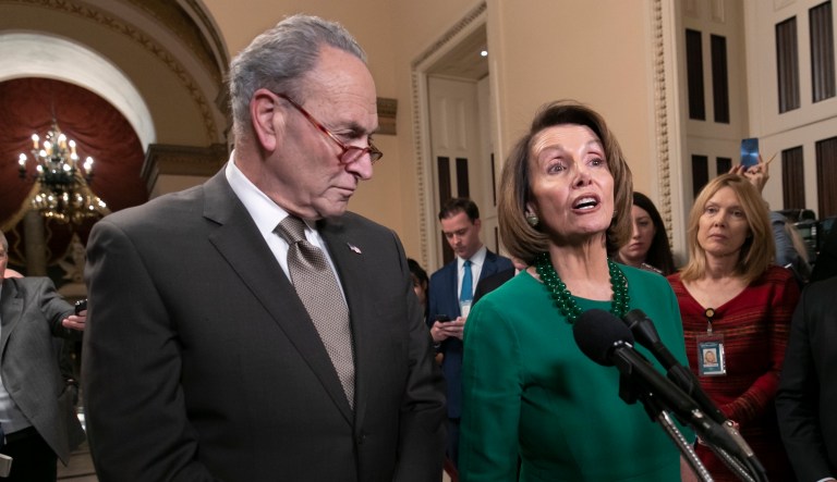 Rep. Mark Meadows, R-N.C., chairman of the House Freedom Caucus, walks as he speaks with reporters on Capitol Hill, Friday, Dec. 21, 2018, in Washington.