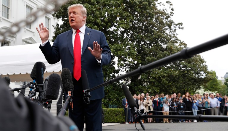 President Donald Trump speaks to the media as he departs the White House, Friday, April 26, 2019, as he leaves Washington headed to Indianapolis where he is expected to speak at the annual meeting of the National Rifle Association.