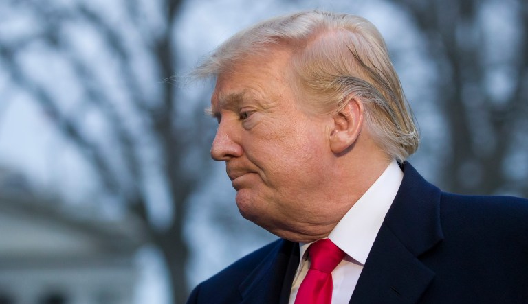 President Donald Trump departs after speaking with the media after stepping off Marine One on the South Lawn of the White House, Sunday, March 24, 2019, in Washington.