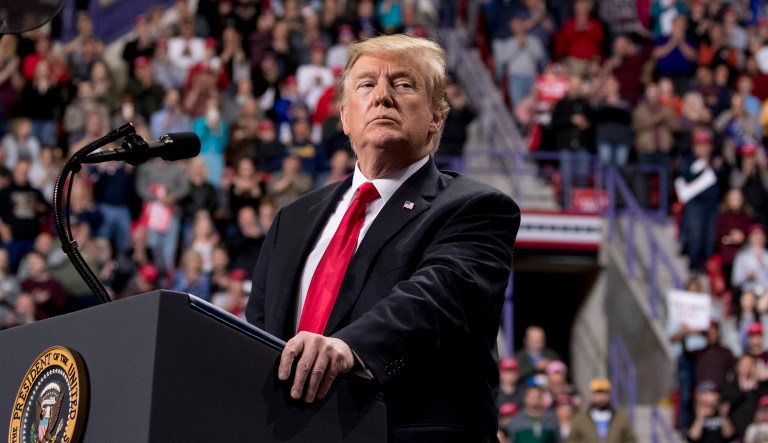 President Donald Trump pauses while speaking at a rally at Resch Center Complex in Green Bay, Wis., Saturday, April 27, 2019.