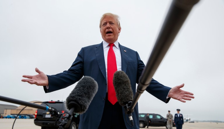 President Donald Trump talks with reporters before boarding Air Force One, Thursday, May 31, 2018, in Andrews Air Force Base, Md.