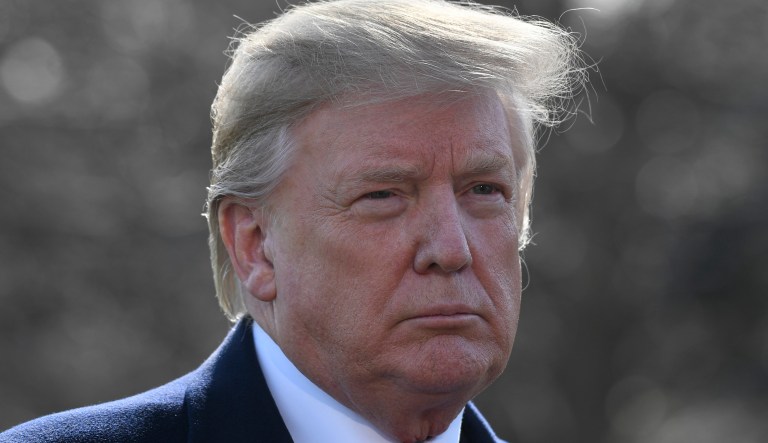 In this March 28, 2019, photo, President Donald Trump talks with reporters before boarding Marine One on the South Lawn of the White House in Washington for the short trip to Andrews Air Force Base in Maryland.
