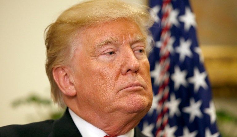 President Donald Trump stands during an event to announce a Merck, Pfizer, and Corning joint partnership to make glass containers for medication, in the Roosevelt Room of the White House, Thursday, July 20, 2017, in Washington.