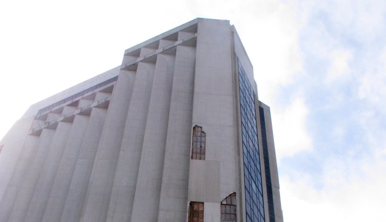 This March 12, 2020 photo shows the exterior of the former Trump Plaza casino in Atlantic City N.J. Atlantic City officials held a news conference calling for the immediate demolition of the building, parts of which have crumbled and fallen onto a sidewalk.