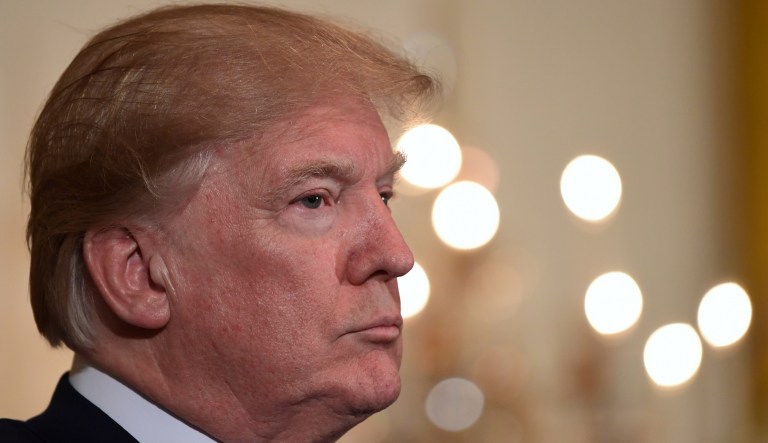 President Donald Trump attends a Greek Independence Day Celebration reception in the East Room of the White House in Washington, Thursday, March 22, 2018.