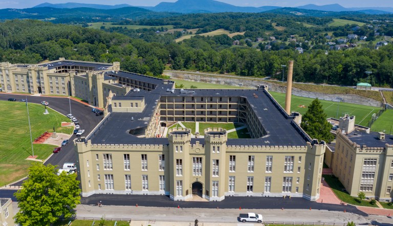 File This Wednesday July 15, 2020 file photo shows the barracks at Virginia Military Institute in Lexington, Va.  Virginia Military Instituteâs Board of Visitors voted Thursday to remove the prominent statue of Confederate Gen. Stonewall Jackson.