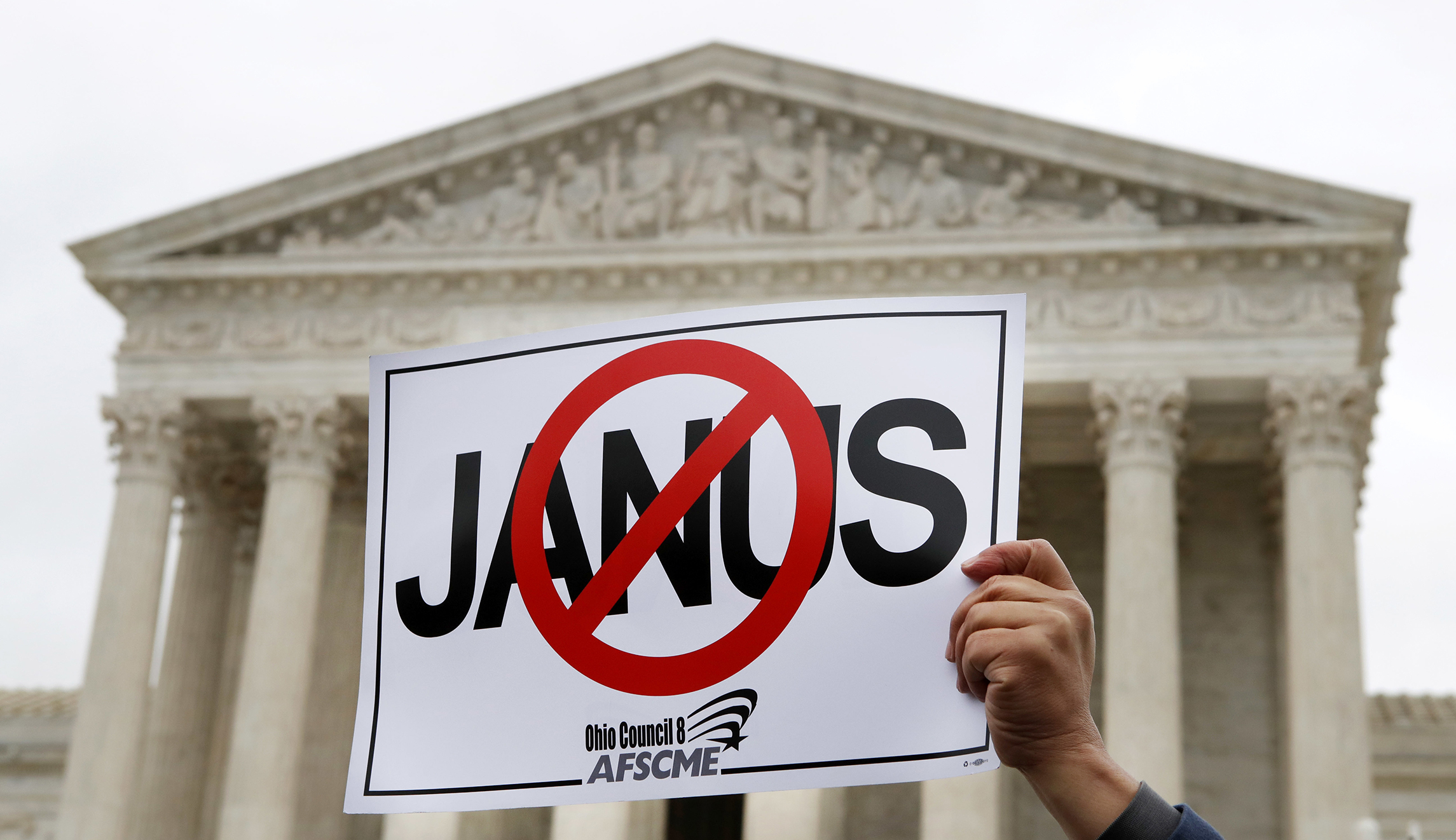 Class action suit alleges Wash. state, union conspired to ignore Supreme Court ruling