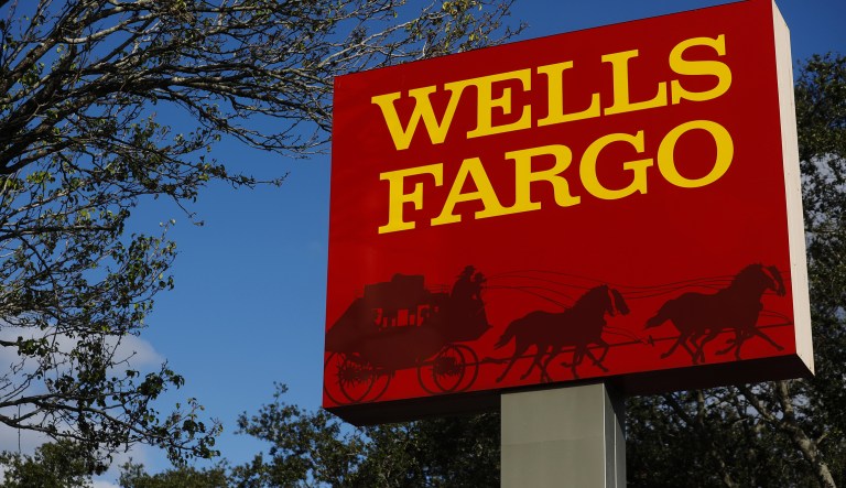 Signage is displayed outside of a Wells Fargo & Co. bank branch in St. Petersburg, Florida, U.S., on Monday, Jan. 14, 2019. Wells Fargo & Co. is scheduled to release earnings figures on January 15.