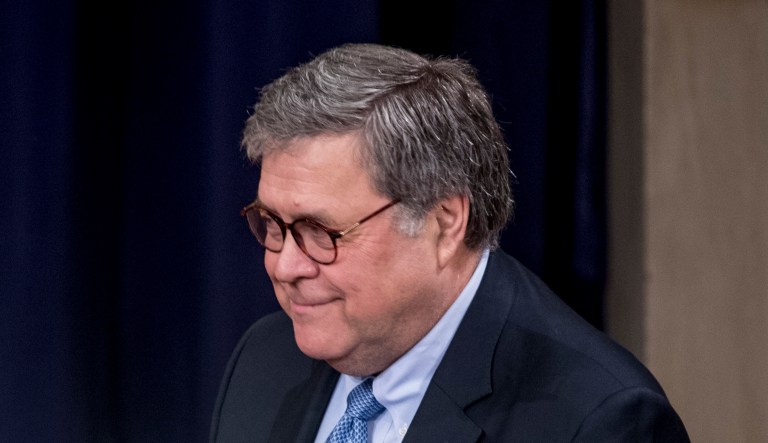 First lady Melania Trump, accompanied by Attorney General William Barr, right, smiles as she finishes a speech at the Justice Department's National Opioid Summit at the Department of Justice, Friday, March 6, 2020, in Washington.