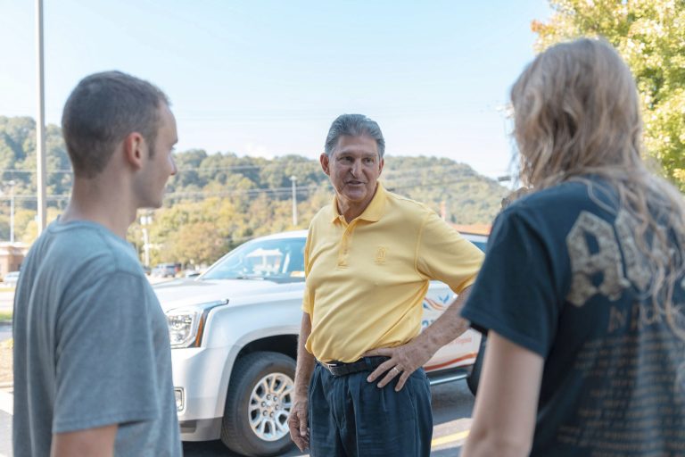 Lucia Albright, 10, of Lansdale, Pa., gets her photo taken on a fake bull at the 104th Pennsylvania Farm Show in Harrisburg, Pa., on Jan. 9. (Justin Merriman/for the Washington Examiner) 