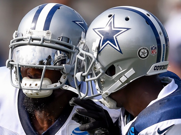 The Arm in Arm decal was unveiled during a ceremony on the first day of Cowboys training camp, meant to be a sign of support and unity for both the Dallas police and the city following the fatal shootings of five police officers last month. (AP Photo/Gus Ruelas)