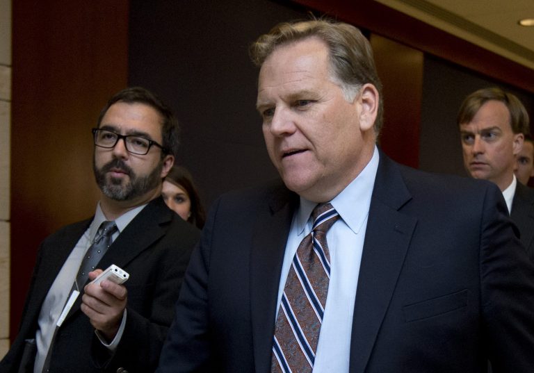 House Intelligence Committee Chairman Rep. Mike Rogers, R-Mich., is followed by reporters as he arrives for a briefing on Capitol Hill in Washington in this June 11, 2013, file photo. (AP Photo/Manuel Balce Ceneta, File)