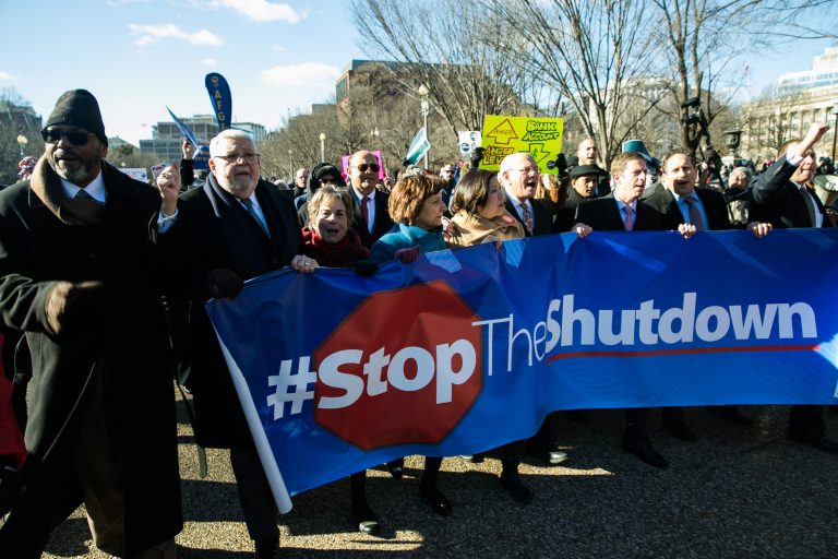 Union members and other federal employees rally to call for an end to the partial government shutdown, Thursday, January, 10, 2019, outside the White House. 