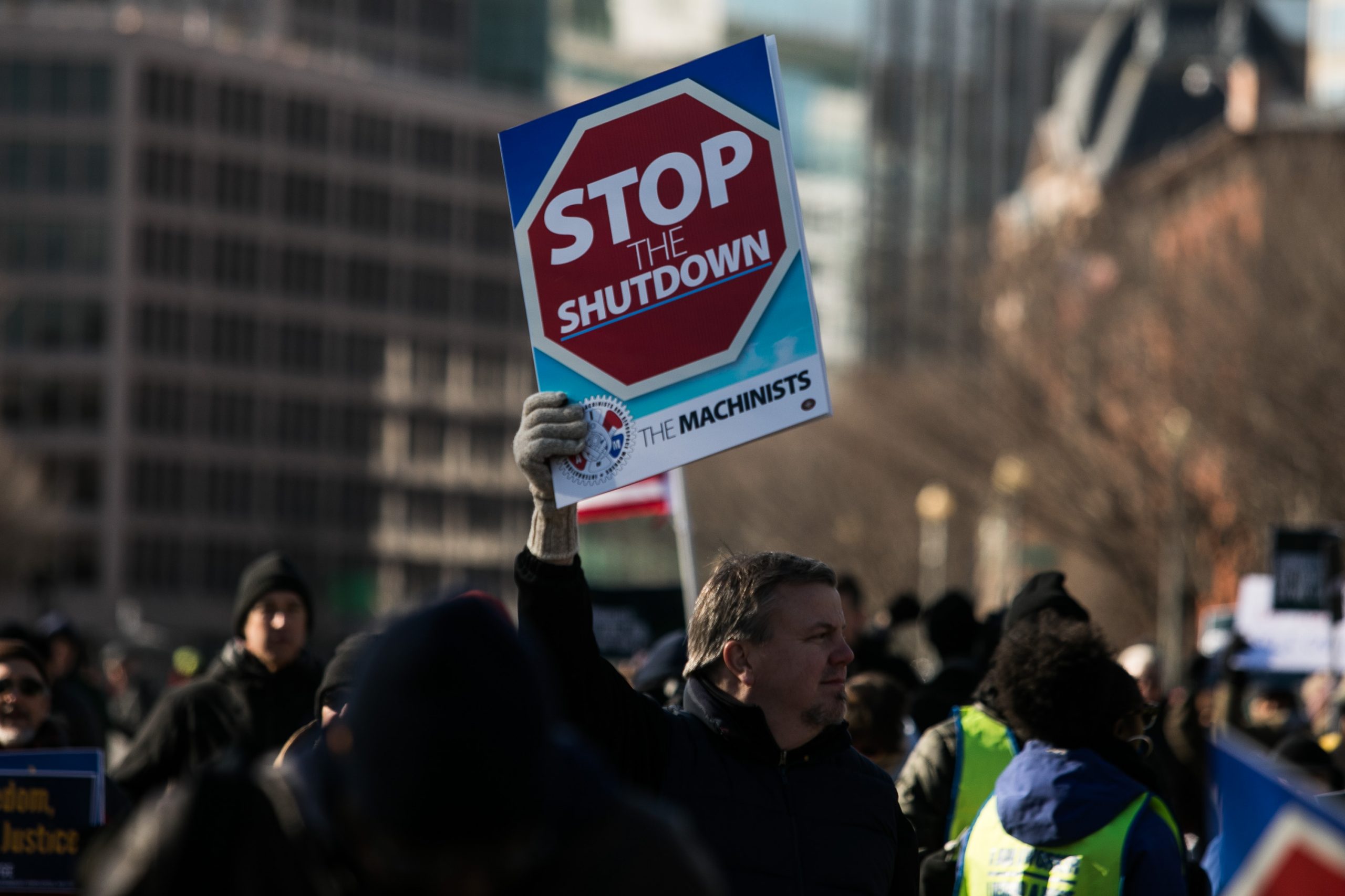 Union members and other federal employees rally to call for an end to the partial government shutdown on Thursday outside the White House. 